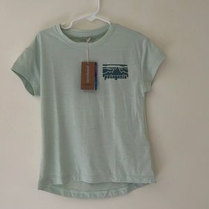 Patagonia girls cap cool daily shirt.